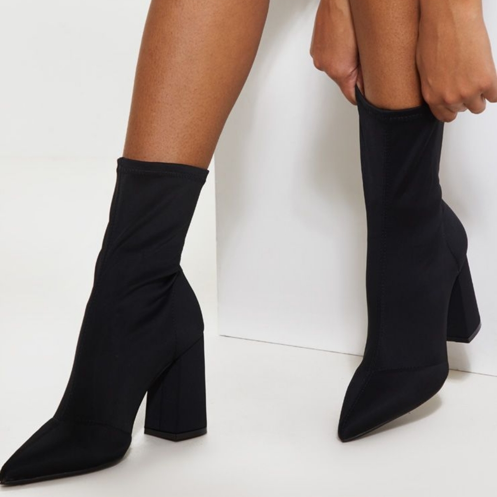 Women's black block heeled point toe sock boot